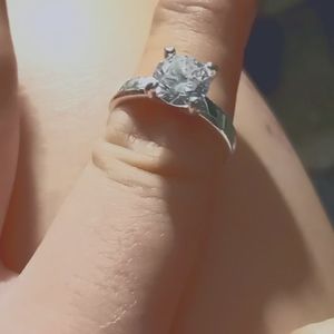 Sterling silver solitaire white sapphire engagemen